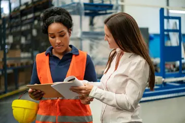 Factory manager and employee